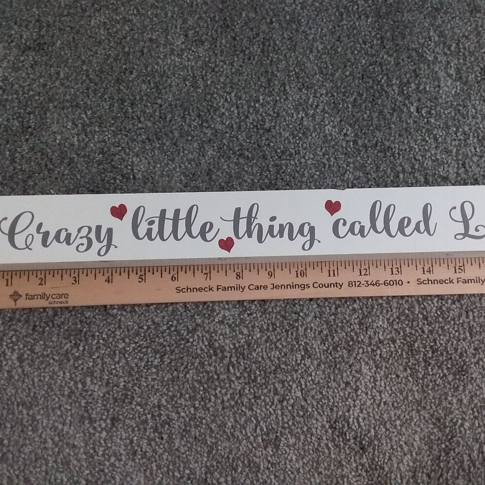 Crazy little thing called love sign